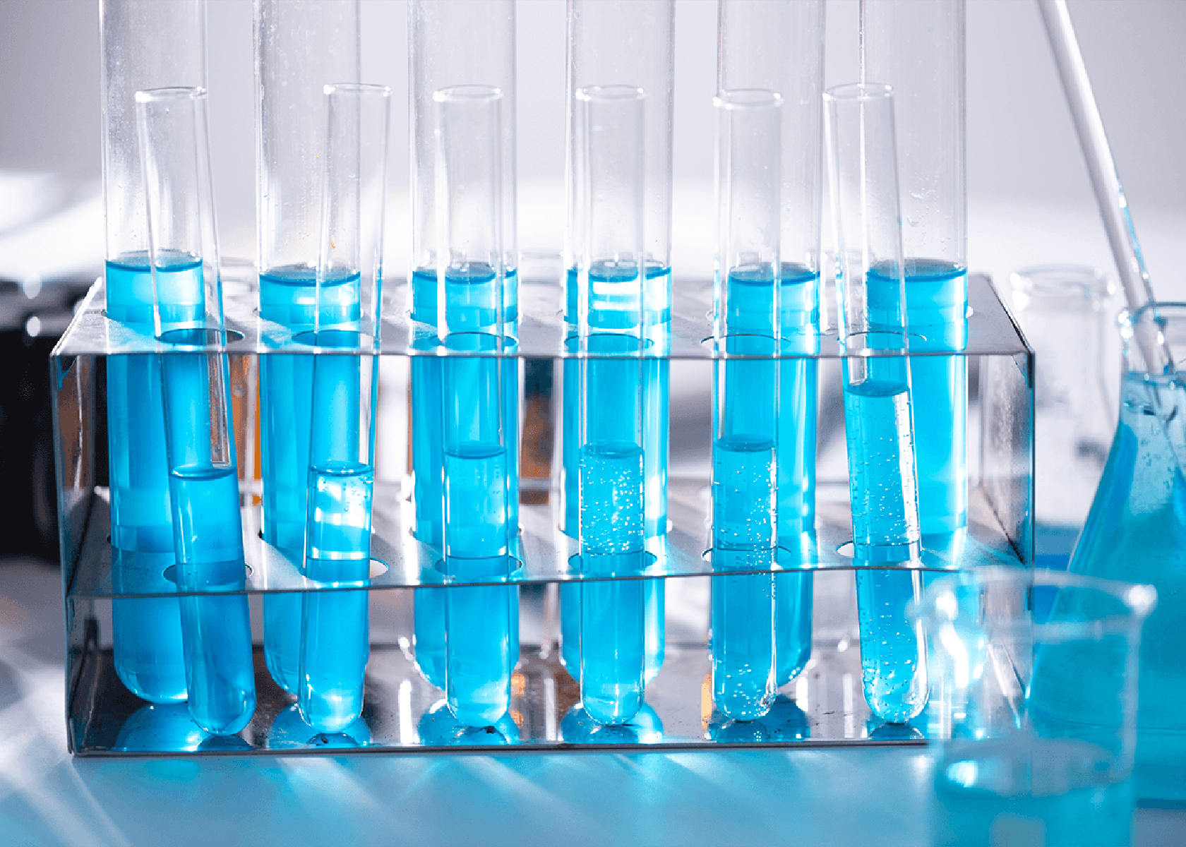 medical science test-tubes with blue liquid