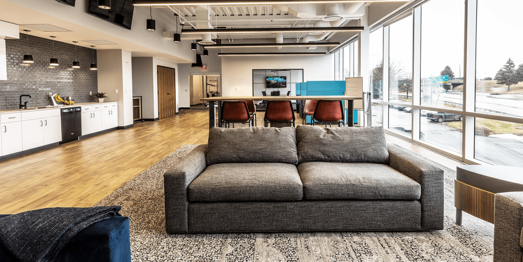 gray couch in collaborative office space