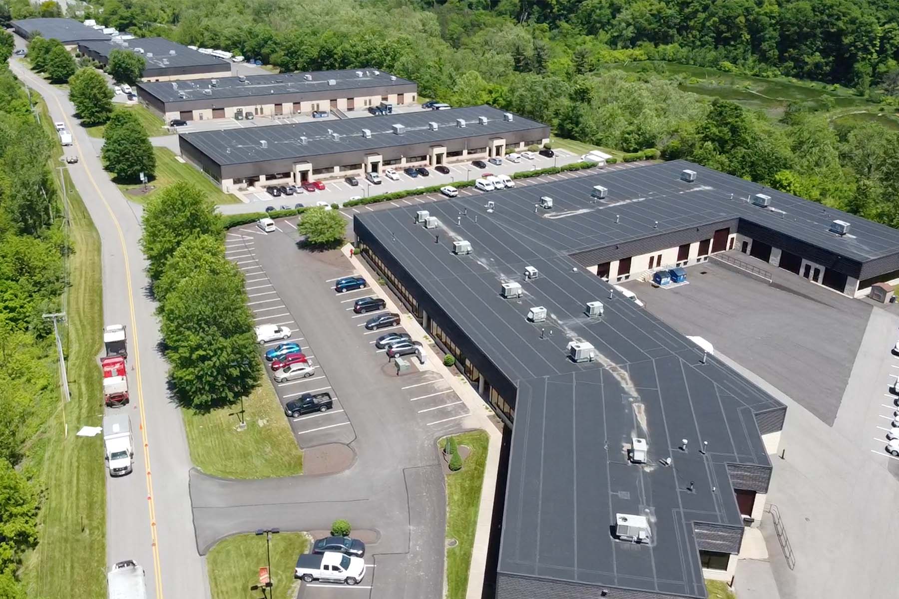 Aerial view of five buildings at Bursca business park